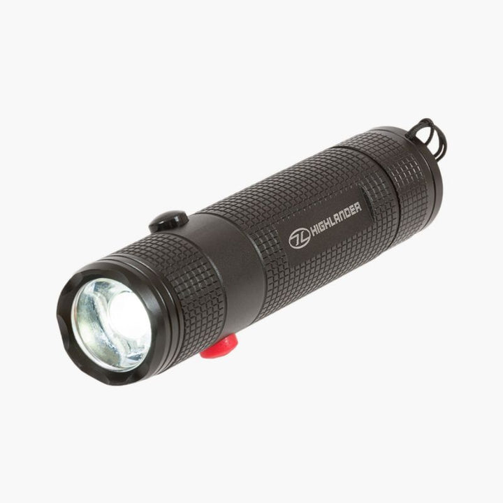 highlander hawkeye torch demonstrates full beam white light and below shows red. top black button near bulb and red button on bottom. Square pattern grip covers casing