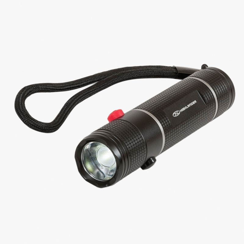 highlander hawkeye torch demonstrates full beam white light . top black button near bulb and red button on bottom. Square pattern grip covers casing