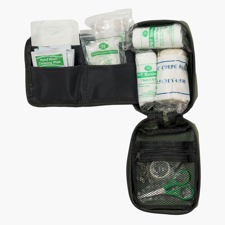 highlander military first aid. midi pouch open showing full contents