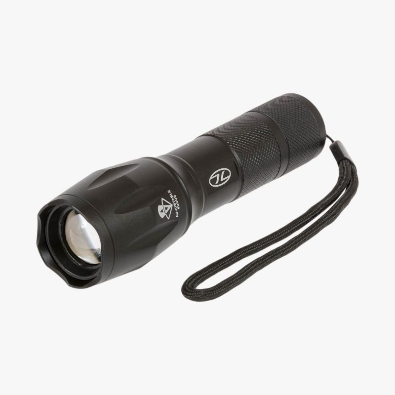 front and rear of orion torch. black aluminium case with white highlander logo and wrist strap. contoured lens case to change zoom. rear orange button