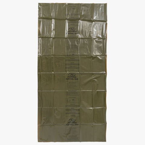 highlander olive green survival bivi bag opened. usage instructions in black lettering