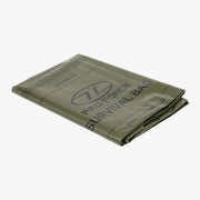 highlander olive green survival bivi bag folded. usage instructions in black lettering