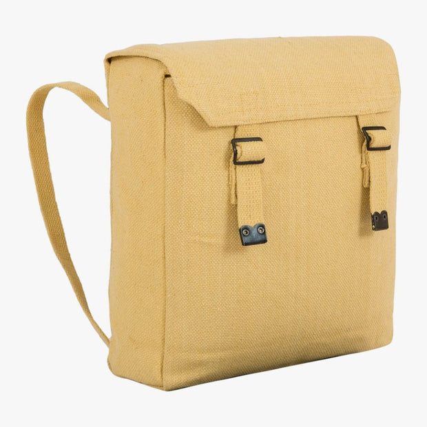 beige web backpack rear shoulder strap and 2 front fastening vertical straps through black buckle. Lid covers top